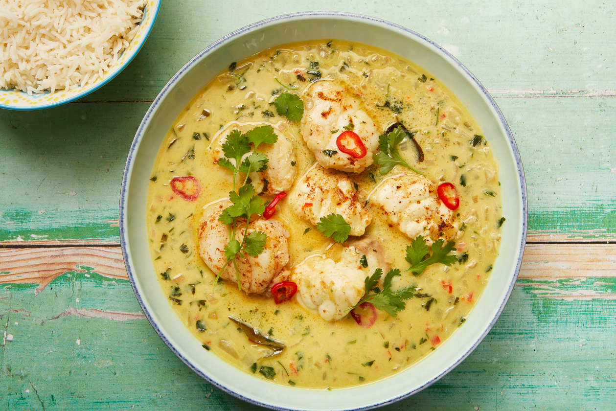 A photograph of Monkfish coconut curry